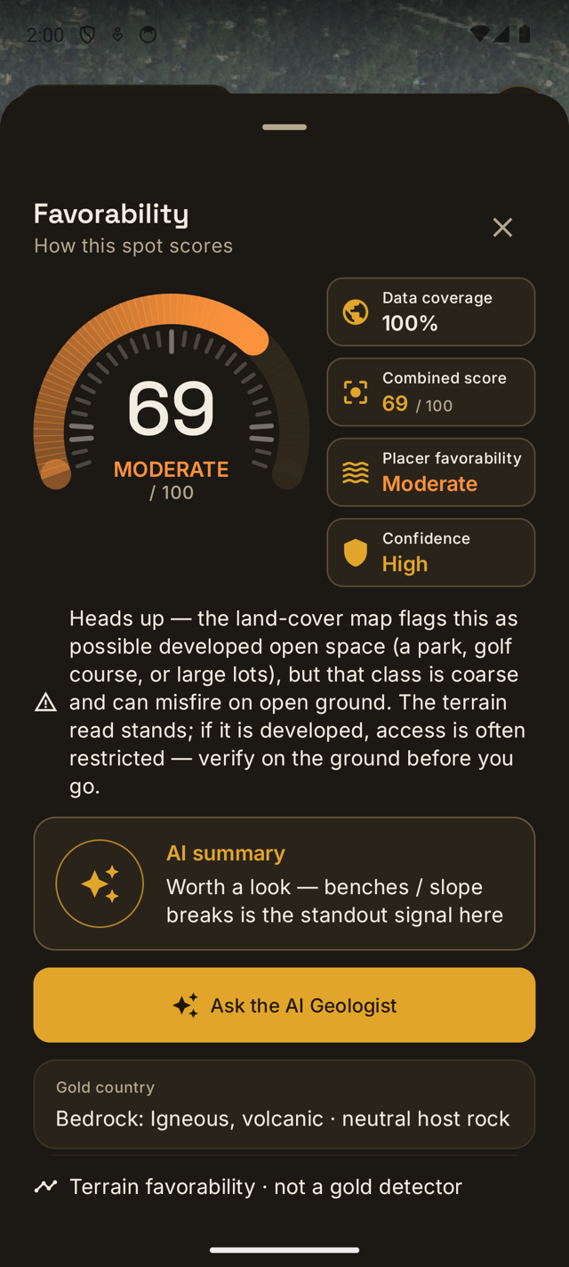 Lodeline's favorability sheet: a large combined ring reading 69 MODERATE, a plain-words read of gold country (Source) versus the trap at this exact spot, an "Ask the AI geologist" button, a bedrock geology block with the gold-occurrence count on record, and Spot terrain factor bars for drainage, favorable slope, and benches.